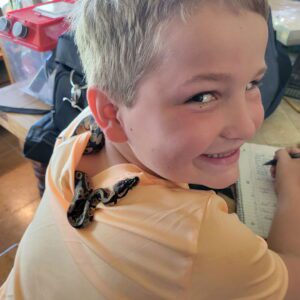 The kid with snake